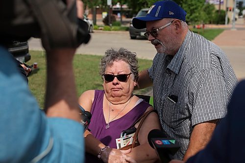 16062023
Dauphin residents Sandra and Glenn Kaleta speak to journalists on Friday in the wake of the tragedy that claimed the lives of 15 Dauphin residents and injured 10 others on the Trans Canada Highway at Carberry on Thursday. The Kaleta&#x2019;s are members of the Dauphin Active Living Centre and friends with some of the victims of the collision. 
(Tim Smith/The Brandon Sun)