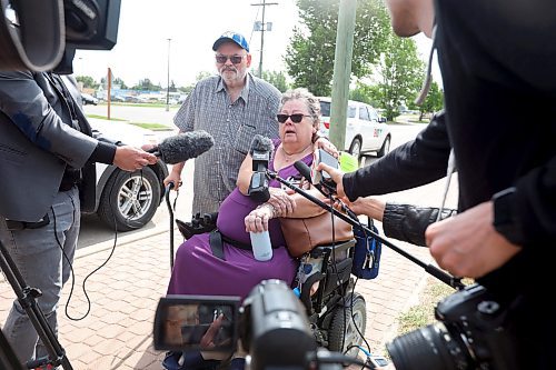 16062023
Dauphin residents Glenn and Sandra Kaleta speak to journalists on Friday in the wake of the tragedy that claimed the lives of 15 Dauphin residents and injured 10 others on the Trans Canada Highway at Carberry on Thursday. The Kaleta&#x2019;s are members of the Dauphin Active Living Centre and friends with some of the victims of the collision. 
(Tim Smith/The Brandon Sun)