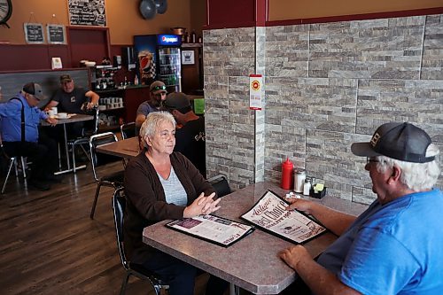 16062023
Debbie and Russell Murray have lunch at Corrina&#x2019;s on Main in Dauphin on Friday, a day after the tragedy that claimed the lives of 15 Dauphin residents and injured 10 others on the Trans Canada Highway at Carberry on Thursday. The Murray&#x2019;s have a family connection to one of the people in the bus that was involved in the collision.
(Tim Smith/The Brandon Sun)