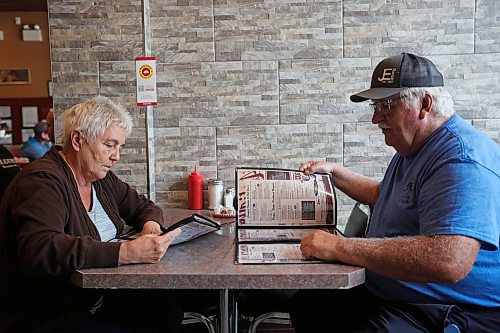 16062023
Debbie and Russell Murray have lunch at Corrina’s on Main in Dauphin on Friday, a day after the tragedy that claimed the lives of 15 Dauphin residents and injured 10 others on the Trans Canada Highway at Carberry on Thursday. The Murray’s have a family connection to one of the people in the bus that was involved in the collision.
(Tim Smith/The Brandon Sun)