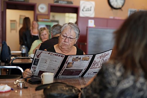 16062023
Margaret Moar and Roxanne Ross have lunch at Corrina&#x2019;s on Main in Dauphin on Friday with their minds on the tragedy that claimed the lives of 15 Dauphin residents and injured 10 others on the Trans Canada Highway at Carberry on Thursday. (Tim Smith/The Brandon Sun)