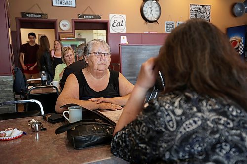 16062023
Margaret Moar and Roxanne Ross have lunch at Corrina&#x2019;s on Main in Dauphin on Friday with their minds on the tragedy that claimed the lives of 15 Dauphin residents and injured 10 others on the Trans Canada Highway at Carberry on Thursday. (Tim Smith/The Brandon Sun)