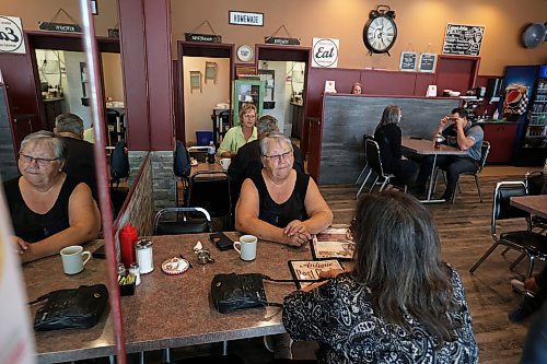 16062023
Margaret Moar and Roxanne Ross have lunch at Corrina&#x2019;s on Main in Dauphin on Friday with their minds on the tragedy that claimed the lives of 15 Dauphin residents and injured 10 others on the Trans Canada Highway at Carberry on Thursday. (Tim Smith/The Brandon Sun)