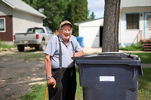 16062023
Dauphin Resident Matt Burdeniuk brings in his garbage bin from the street. Burdeniuk used to take bus trips to the Sand Hills Casino south of Carberry. (Tim Smith/The Brandon Sun)