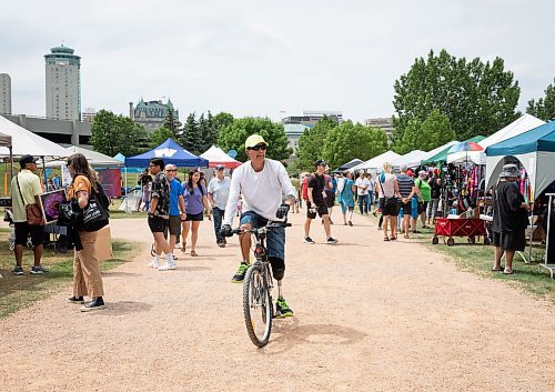 JESSICA LEE / WINNIPEG FREE PRESS

A biker passes through APTN Indigenous Day Live at The Forks June 17, 2023

Stand up