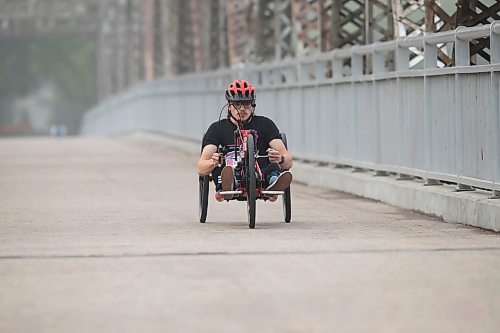 BROOK JONES / WINNIPEG FREE PRESS
A wheeler crosses the BDI bridge while competing in the Half Marathon at the Manitoba Marathon in Winnipeg, Man., Sunday, June 18, 2023. 