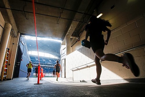 JOHN WOODS / WINNIPEG FREE PRESS
Runners enter the stadium and finish area in the 45th Manitoba Marathon in Winnipeg, Sunday, June 18, 2023. 

Reporter: Donald