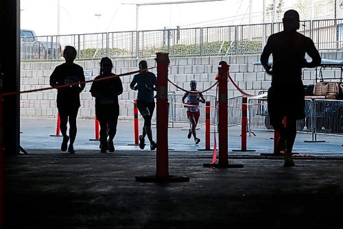 JOHN WOODS / WINNIPEG FREE PRESS
Runners enter the stadium and finish area in the 45th Manitoba Marathon in Winnipeg, Sunday, June 18, 2023. 

Reporter: Donald