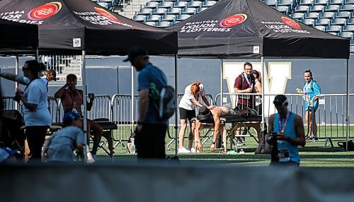 JOHN WOODS / WINNIPEG FREE PRESS
Runners get massages after finishing the 45th Manitoba Marathon in Winnipeg, Sunday, June 18, 2023. 

Reporter: Donald