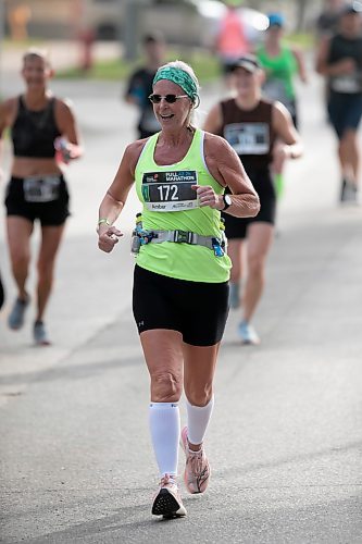 BROOK JONES / WINNIPEG FREE PRESS
Amber Driedger runs down Assiniboine Avenue, while competing in the full marathon at the Manitoba Marathon in Winnipeg, Man., Sunday, June 18, 2023.