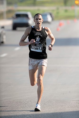 BROOK JONES / WINNIPEG FREE PRESS
Roger Hopper of Chesapeake, Va., runs down Pembina Highway on his way to winning the men's full marathon, which was the 45th running of the Manitoba Marathon in Winnipeg, Man., Sunday, June 18, 2023.