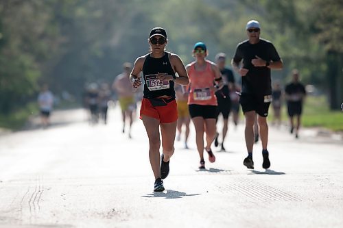 BROOK JONES / WINNIPEG FREE PRESS
Victoria Cavazos runs down Crescent Drive, while competing in the half marathon at the Manitoba Marathon in Winnipeg, Man., Sunday, June 18, 2023.