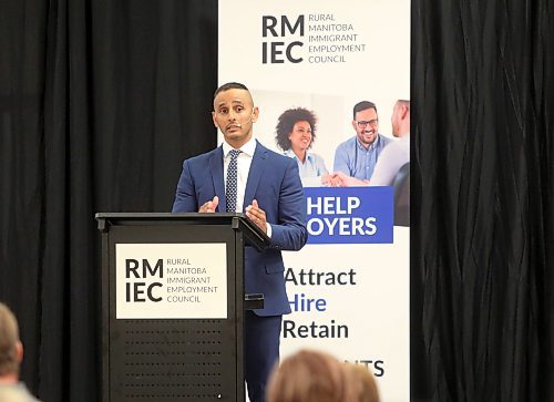 Enver Naidoo, CEO of Westman Immigrant Services addresses the crowd during the inaugural Workforce Development Summit hosted by the Rural Manitoba Immigrant Employment Council (RMIEC), which is an initiative of Westman Immigrant Services, at the Keystone Centre on Monday. (Michele McDougall/The Brandon Sun)
