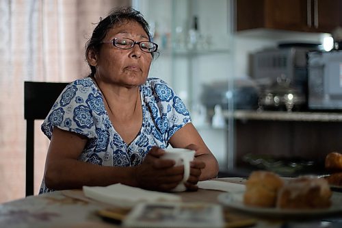 Daniel Crump / Winnipeg Free Press. Vivian Caron, of Lake St. Martin First Nation, sits at her mothers dining room table as she talks about her son Evan Caron. Evan was 33 when he was shot and killed by Winnipeg Police in 2017. June 17, 2023.