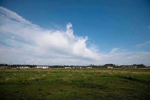 Daniel Crump / Winnipeg Free Press. New homes stand in a row on the Lake St. Martin First Nation. The community was rebuilt in a new location after a devastating flood that forced residents to evacuate to Winnipeg and destroyed the old town site. June 17, 2023.
