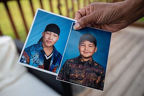 Daniel Crump / Winnipeg Free Press. Vivian Caron, of Lake St. Martin First Nation, holds school pictures of her son, Evan Caron, who was shot and killed by Winnipeg Police in 2017 at the age of 33. June 17, 2023.