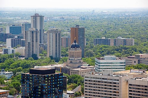 Mike Deal / Winnipeg Free Press
The Manitoba Legislative Building with the Evergreen Towers and 55 Nassau Street North rising up behind it Tuesday afternoon as seen from the top of 300 Main Street.
230620 - Tuesday, June 20, 2023.