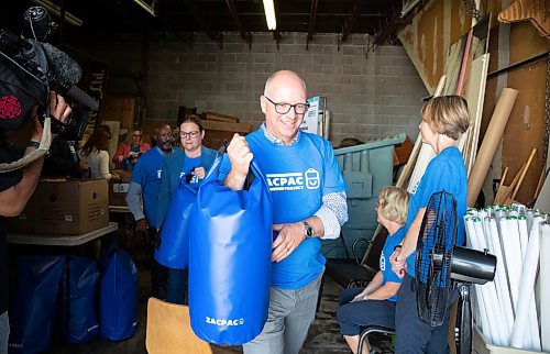 JESSICA LEE / WINNIPEG FREE PRESS

Mayor Scott Gillingham is photographed June 20, 2023 at a community volunteering event in the Exchange District for ZacPac. About 40 volunteers gathered to make ZacPacs, which are filled with survival gear for those experiencing homelessness.

Reporter: Cierra