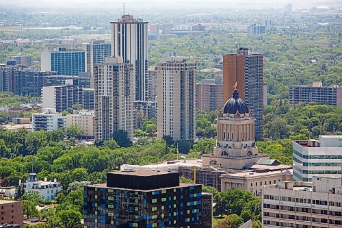 Mike Deal / Winnipeg Free Press
The Manitoba Legislative Building with the Evergreen Towers and 55 Nassau Street North rising up behind it Tuesday afternoon as seen from the top of 300 Main Street.
230620 - Tuesday, June 20, 2023.