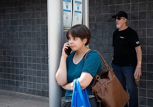 JESSICA LEE / WINNIPEG FREE PRESS

Angelina Farrell-Ulrich waits for the bus at the Graham and Vaughan bus stop June 20, 2023 at 4 pm.

Reporter: Katrina Clarke