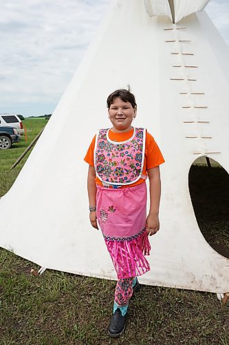 Paisley Shannacappo, age 7, was proud to represent her culture at the Rolling River First Nation Pow Wow on Wednesday. (Miranda Leybourne/The Brandon Sun)