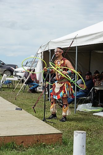 Dallas Arcand Jr. told traditional stories and demonstrated hoop dancing at the Rolling River First Nation Pow Wow on Wednesday. (Miranda Leybourne/The Brandon Sun)