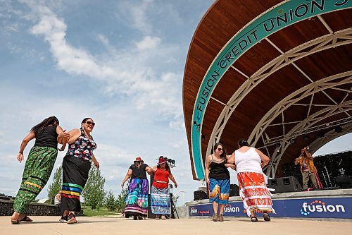 Women dance as Métis Tradition performs during the National Indigenous Day celebrations at the Riverbank Discovery Centre on Wednesday. (Tim Smith/The Brandon Sun)