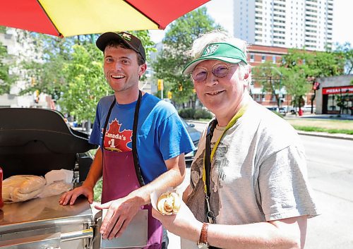 RUTH BONNEVILLE / WINNIPEG FREE PRESS

24 hour project - Broadway Hotdog cart

Justin Kalinski has a hot dog cart, Mister K's Hot Dogs, always in front of WCB building on Broadway.  He started working with his grandpa as a preteen, then he took it over years later, putting himself through Business School at University of Manitoba with his earnings. 

Longtime, daily customer, Markus Buchart, a lawyer working in the area, buys a hot dog from Justin Tuesday.


June 20th, 2023
