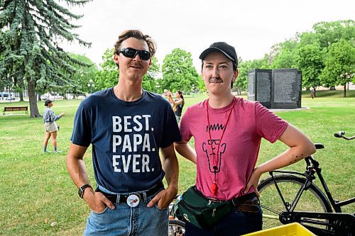 Mike Sudoma/Winnipeg Free Press
(Left tor right) Lee Klimpke and Daria Magnus-Walker wait for riders to meet up on the Manitoba Legislative Grounds for their Bike Jelly bike jam Tuesday evening 
June 20, 2023