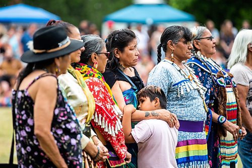 MIKAELA MACKENZIE / WINNIPEG FREE PRESS


Sixties scoop survivor Geraldine Traverse hugs her granddaughter, Zoey Travers (six), while being honoured with a song and a star blanket at the National Indigenous Peoples Day Pow Wow at The Forks on Wednesday, June 21, 2023.  For Cierra Bettens story.
Winnipeg Free Press 2023