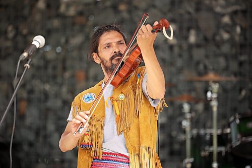 21062023
Steven Demontigny with Metis Tradition plays the fiddle while the band performs at the National Indigenous Day celebrations at the Riverbank Discovery Centre on Thursday. 
(Tim Smith/The Brandon Sun)