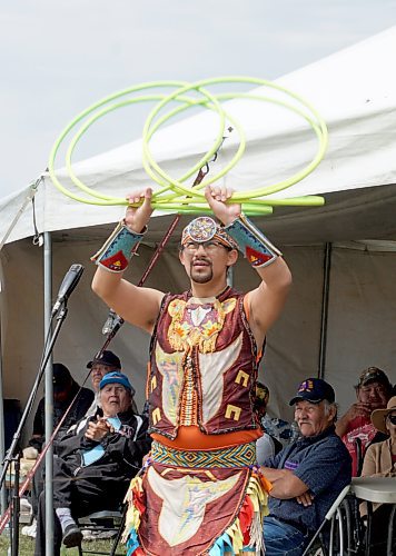 Dallas Arcand Jr. told traditional stories and demonstrated hoop dancing at the Rolling River First Nation Pow Wow on June 21. (Miranda Leybourne/The Brandon Sun)