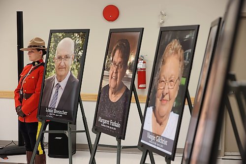 16052023
An RCMP officer stands beside photos of the 16 individuals who died in the June 15, 2023, collision near Carberry, Manitoba during a press conference at Credit Union Place in Dauphin where the names of the sixteen individuals were announced to the media. Family members and first responders were on hand for the press conference.  (Tim Smith/The Brandon Sun)