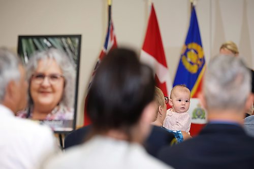 22062023
A baby looks around during a press conference at Credit Union Place in Dauphin on Thursday where the names of the sixteen individuals who died in the June 15, 2023, collision near Carberry, Manitoba were announced to the media. Family members and first responders were on hand for the press conference.  (Tim Smith/The Brandon Sun)