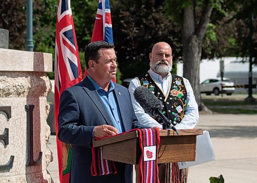 Mike Thiessen / Winnipeg Free Press 
Economic Development, Investment, and Trade Minister Jeff Wharton (left) speaking outside the Legislative Building, with Will Goodon, a member of the MMF Executive Committee of Cabinet and MMF Minister of both Housing and Property Management. The Manitoba government and the Manitoba Métis Federation have signed an agreement to transfer control of the Métis economic fund to the Red River Métis. For Danielle Da Silva. 230623 – Friday, June 23, 2023