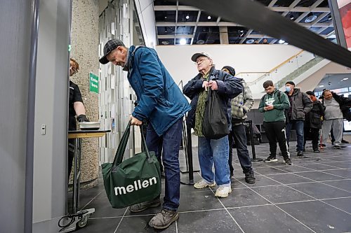 RUTH BONNEVILLE / WINNIPEG FREE PRESS 

Local - Library opens

Security personal check for dangerous metal objects on being carried by library users on the first day of the Millennium Library opening Monday.  Lineups formed during the first 45 mins due to the security checks.


See story.
Jan 23rd,  2023