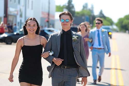 Brooke Thompson and Jase Wareham take part in this year’s Rivers Collegiate graduate parade, which took place along 2nd Avenue in Rivers. (Kyle Darbyson/The Brandon Sun)