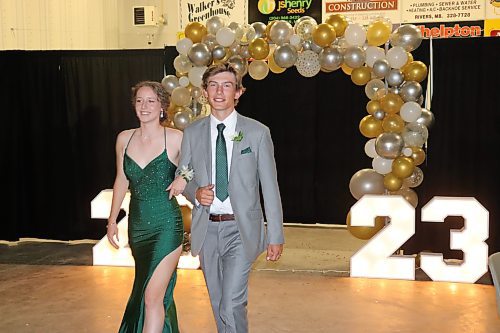 Rivers Collegiate students Alexis McLean and Nolan Perrault take part in Friday’s grand march that kicked off the evening portion of this year’s graduation festivities at the Riverdale Community Centre. (Kyle Darbyson/The Brandon Sun)