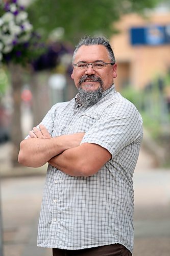 Branodn East Liberal candidate Trenton Zazalak stands along Rosser Avenue on Friday afternoon. (Matt Goerzen/The Brandon Sun)