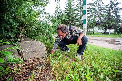 MIKAELA MACKENZIE / WINNIPEG FREE PRESS


Noel Martin shows a capped entrance to underground tunnels on his property in Elma, Manitoba on Thursday, June 22, 2023.  For Eva Wasney story.
Winnipeg Free Press 2023