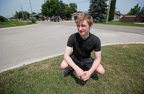 JOHN WOODS / WINNIPEG FREE PRESS
Logan Funk, who saved a young boy from being killed, is photographed near the place where the small boy was mauled by a coyote on Knowles Ave in Winnipeg’s Springfield North area, Sunday, June 25, 2023. 

Reporter: May
