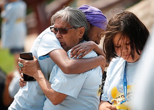 JOHN WOODS / WINNIPEG FREE PRESS
Supporters comfort each other at a Fentanyl Awareness Walk at Oodena Circle Sunday, June 25, 2023. Harlan Fourre died earlier this year after ingesting what is believed to have bee ecstasy laced with opiods

Reporter: May