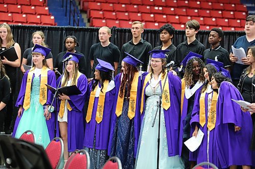 Members of the Vincent Massey Grad Choir sing “I Lived” by OneRepublic during the final minutes of Monday’s graduation ceremony at the Keystone Centre. (Kyle Darbyson/The Brandon Sun)