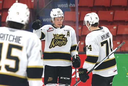 Brandon Wheat Kings forward Nate Danielson, shown celebrating a goal with Nolan Ritchie and Brett Hyland last season, served as co-captain with Ritchie and enjoyed the experience. (Perry Bergson/The Brandon Sun)