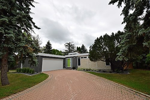 Photos by Todd Lewys / Winnipeg Free Press

This mid-century-modern bungalow has been lovingly maintained, meticulously updated and sits on a private, well-treed peninsula-style lot.