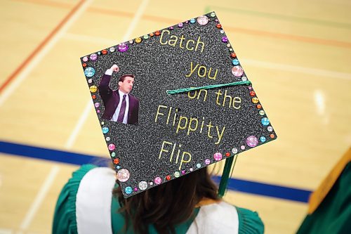27062023
&#xc9;cole Secondaire Neelin High School graduate Avery Simard wears an The Office inspired decorated mortar-board during the high school&#x2019;s graduation and convocation ceremonies at the Brandon University Healthy Living Centre on Tuesday. (Tim Smith/The Brandon Sun)