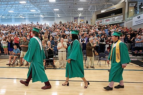 27062023
&#xc9;cole Secondaire Neelin High School graduates file into the main gymnasium at the Brandon University Healthy Living Centre for their graduation and convocation ceremonies on Tuesday. (Tim Smith/The Brandon Sun)