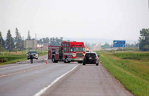 Emergency crews including Brandon Fire, the Brandon Police Service and RCMP, remain at the scene of a collision involving a semi truck and another vehicle on Tuesday evening along Highway 10, just north of the Brandon Municipal Airport. The collision had taken place earlier in the afternoon. (Matt Goerzen/The Brandon Sun)