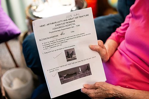 MIKAELA MACKENZIE / WINNIPEG FREE PRESS


Cathy Hannah demonstrates the exercises she does (that she was given in the hospital, and haven&#x574; been updated) in her home on Wednesday, June 28, 2023.  Cathy has been forced to attempt her own rehab after the province denied her coverage for physiotherapy because she &quot;only&quot; received a partial hip replacement. For Malak Abas story.
Winnipeg Free Press 2023