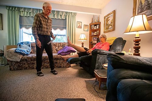 MIKAELA MACKENZIE / WINNIPEG FREE PRESS


Cathy Hannah demonstrates the exercises she does (that she was given in the hospital, and haven&#x574; been updated) in her home on Wednesday, June 28, 2023.  Cathy has been forced to attempt her own rehab after the province denied her coverage for physiotherapy because she &quot;only&quot; received a partial hip replacement. For Malak Abas story.
Winnipeg Free Press 2023